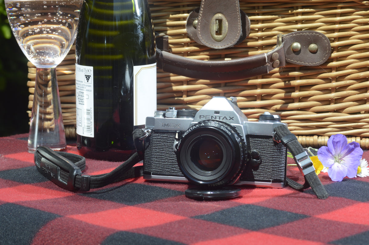 Vintage Pentax MX 35mm SLR Camera with 50mm f1.7 lens. Lovely