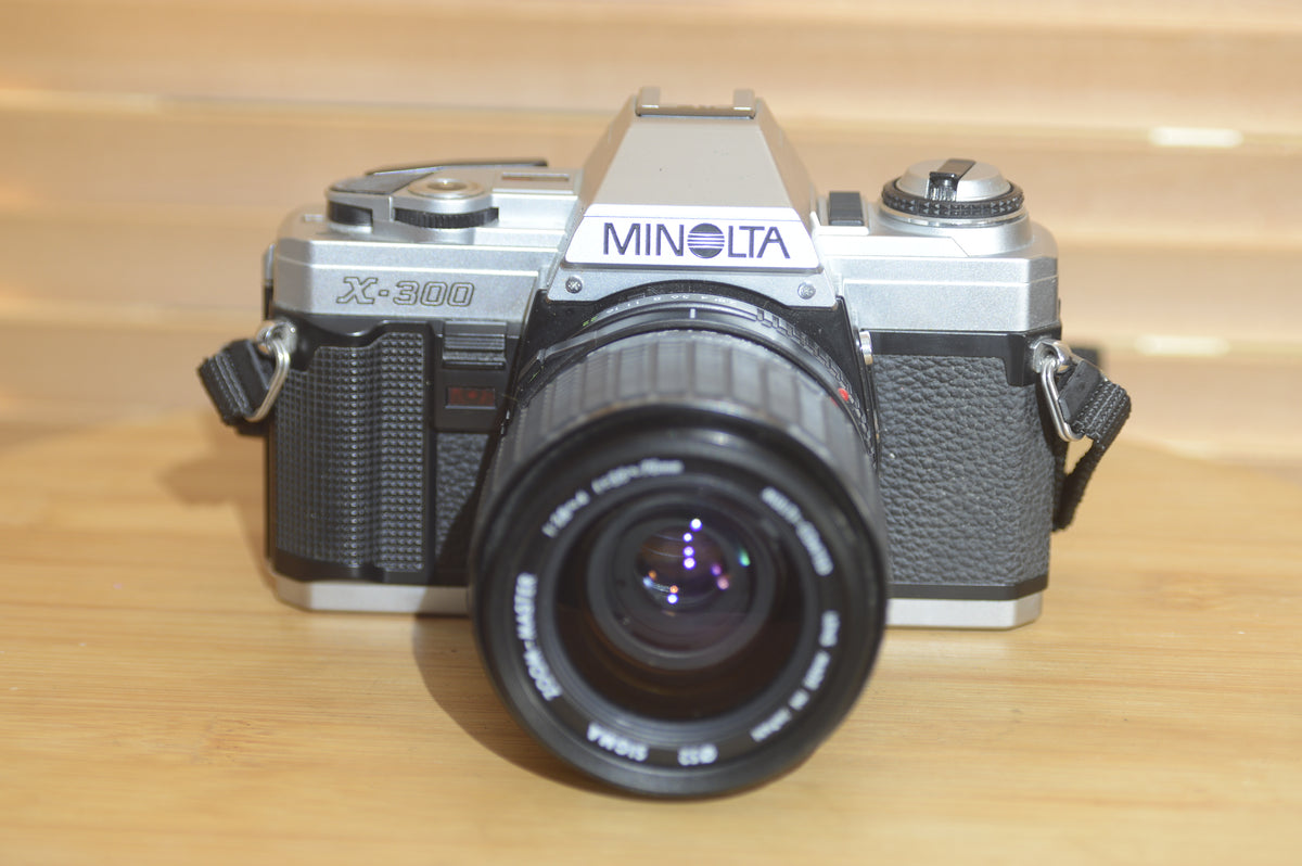 Minolta x-300 sr film camera 50mm lens 1984 outlet vintage 35mm camera extra lens used