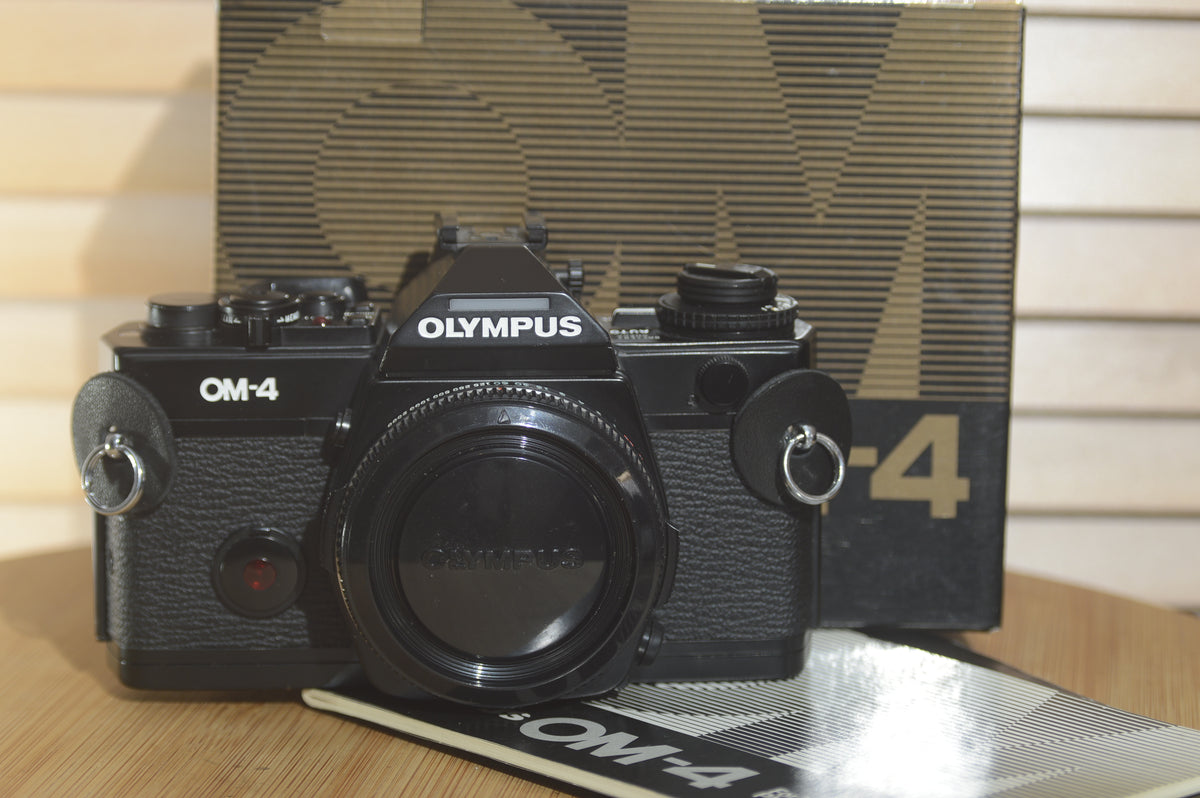 Boxed Black Olympus OM4 SLR Camera Body. In Fantastic condition. Comes