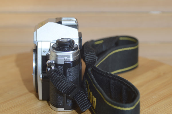 Vintage Nikon FG20 35mm Film Camera with Nikon Strap. Very stylish little SLR.