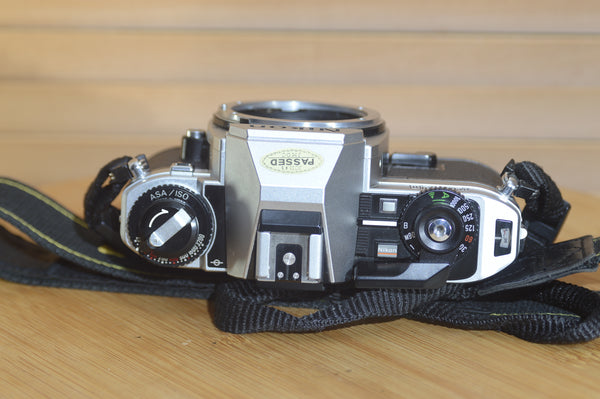 Vintage Nikon FG20 35mm Film Camera with Nikon Strap. Very stylish little SLR.