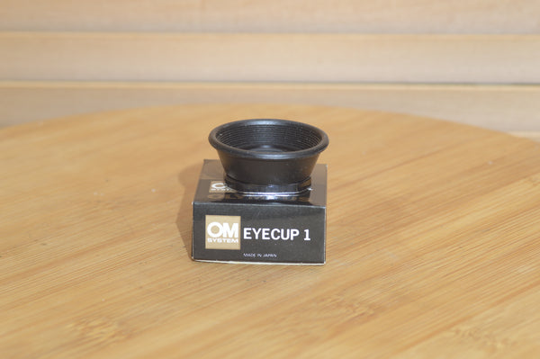 Boxed Olympus Eyecup 1. Great condition. Perfect for that little extra comfort.