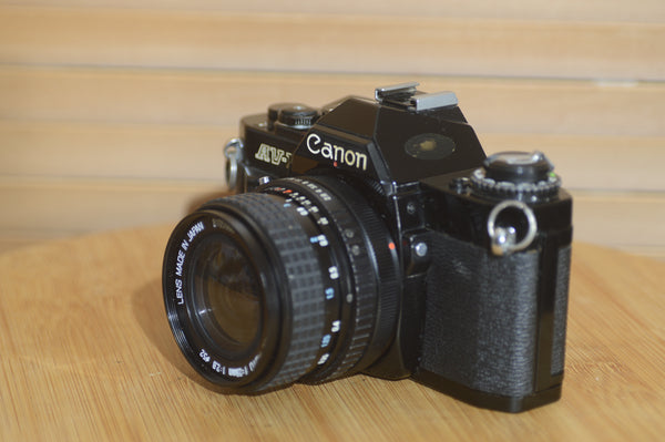 Rare Black Canon AV1 35mm SLR Camera With 28mm f2.8 Lens. Fantastic condition Starter Camera