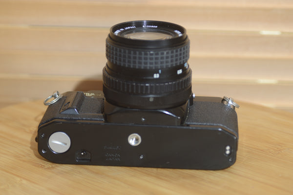 Rare Black Canon AV1 35mm SLR Camera With 28mm f2.8 Lens. Fantastic condition Starter Camera