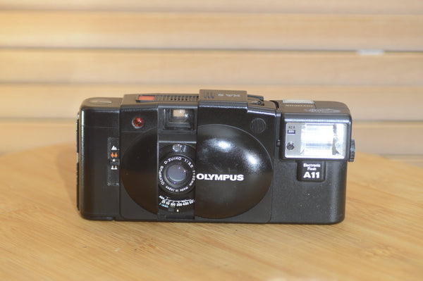 Vintage Olympus XA2 compact camera with A11 Flash and original case. - Rewind Cameras 