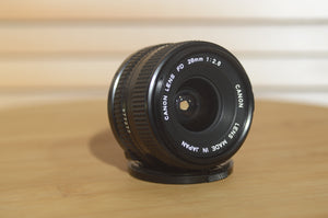 Canon FD 28mm f2.8 lens. This is a fantastic wide angle lens in superb condition. - Rewind Cameras 