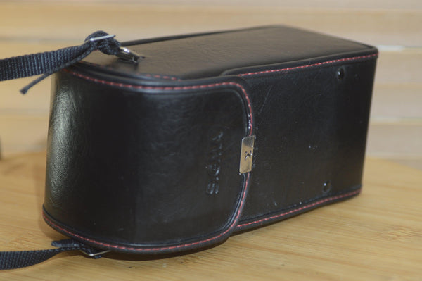 Fantastic Sigma NC-70 Hard Leather Lens Case. Perfect for protecting your Vintage lenses. Pair it with a small zoom or portrait lens - Rewind Cameras 