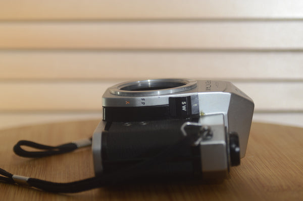Asahi Spotmatic sp 1000 with strap. These are super collectable now, why not add one of our M42 lenses? - Rewind Cameras 
