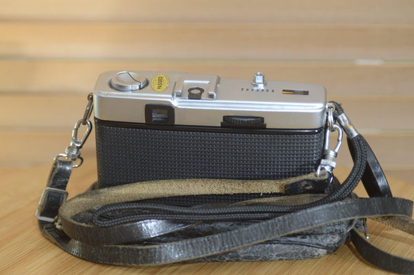 Vintage Olympus Trip 35 compact camera with case, lens cap and manual. - Rewind Cameras 