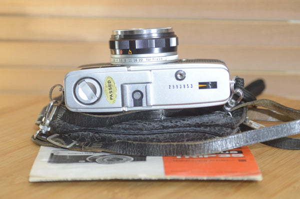 Vintage Olympus Trip 35 compact camera with case, lens cap and manual. - Rewind Cameras 