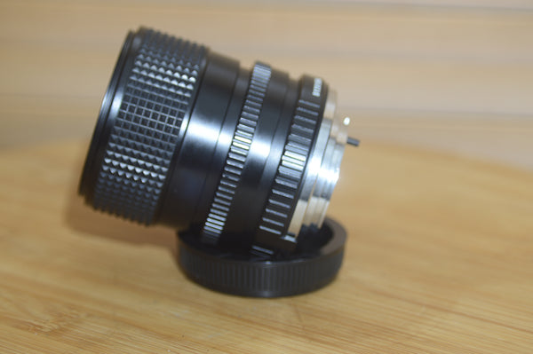 Vintage Minolta MD 28-70mm f3.5- 4.8 lens. Perfect all round lens - Rewind Cameras 