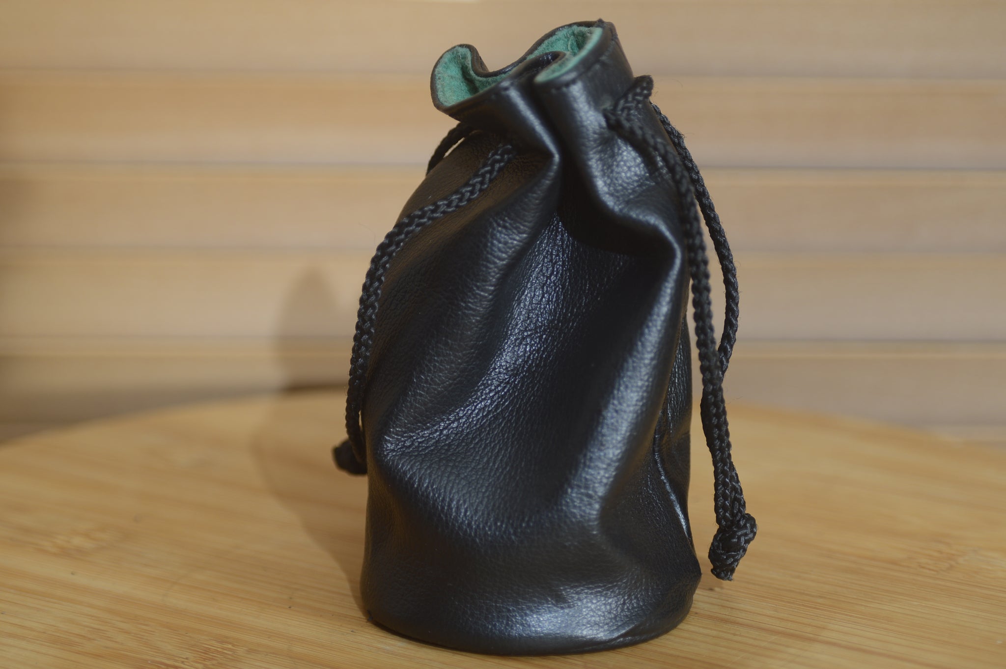 Vintage Black and Greed Soft Leatherette Drawstring Lens Pouch. Ideal for protecting your lens in your bag. - Rewind Cameras 