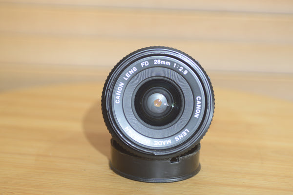 Vintage Canon FD 28mm f2.8 lens. This is a fantastic wide angle lens in great condition. - Rewind Cameras 