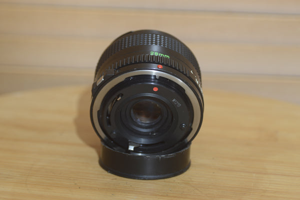 Vintage Canon FD 28mm f2.8 lens. This is a fantastic wide angle lens in great condition. - Rewind Cameras 