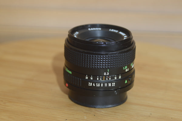 Vintage Canon FD 28mm f2.8 lens. This is a fantastic wide angle lens in great condition. - Rewind Cameras 