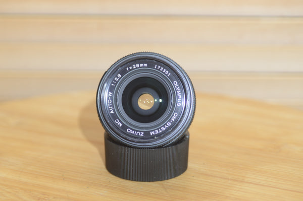 Gorgeous Olympus 28mm f2.8 Zuiko Lens. A perfect addition to your vintage Olympus set up.