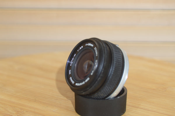 Gorgeous Olympus 28mm f2.8 Zuiko Lens. A perfect addition to your vintage Olympus set up.