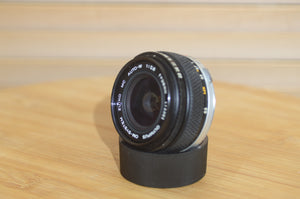 Gorgeous Olympus 28mm f2.8 Zuiko Lens. A perfect addition to your vintage Olympus set up.