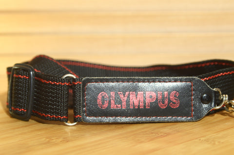 Black and Red Olympus strap. Lovely addition to your Olympus set up. - Rewind Cameras 