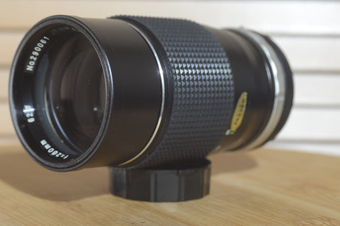 Soligor Auto MC 200mm f3.5 FD lens.  In excellent condition. These are lovely lenses that produce fantastic images - RewindCameras quality vintage cameras, fully tested and serviced