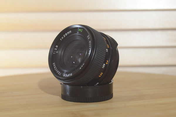 Super Travenar M42 28mm f2.8 Wide Angle Lens. Great sharp bright prime lens - RewindCameras quality vintage cameras, fully tested and serviced
