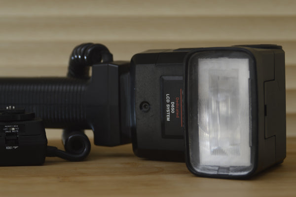 Cobra 650 lcd system Flash gun Canon dedicated.  This is a fantastic flash and super easy to use with the LCD readout. - RewindCameras quality vintage cameras, fully tested and serviced