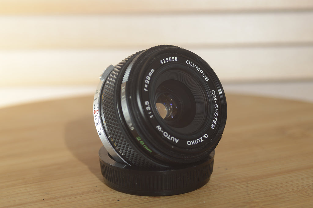 Gorgeous Olympus 28mm f3.5 Zuiko Lens. A perfect addition to your