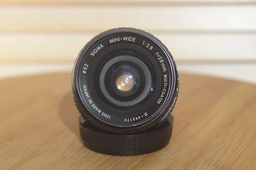 Sigma OM 28mm f2.8 Mini Wide lens. This is a lovely wide angle