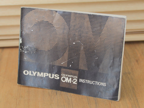 Lovely Olympus OM-2 Instruction Manual. Perfect for beginners or for those that want a refresher in the wonderful world of Film Photography - RewindCameras quality vintage cameras, fully test